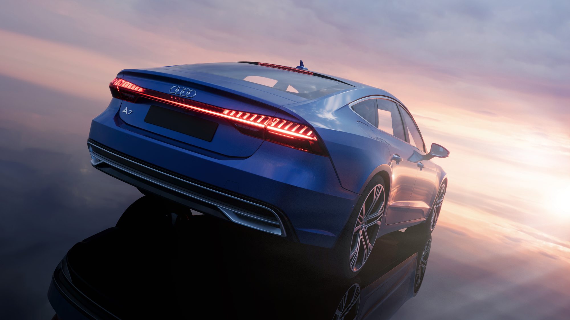 Audi A7 vue de l'arrière en plongée, bandeau lumineux allumé — rendu CGI