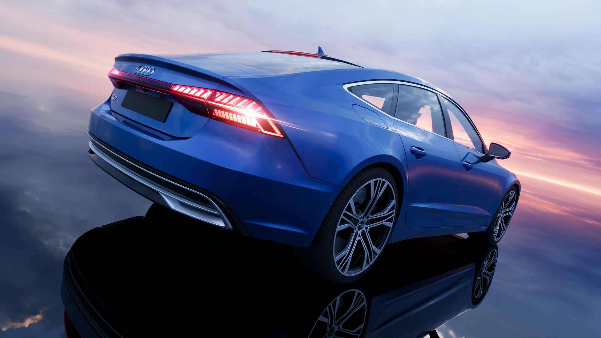 Audi A7 de trois quarts arrière en plongée, feux allumés — rendu CGI